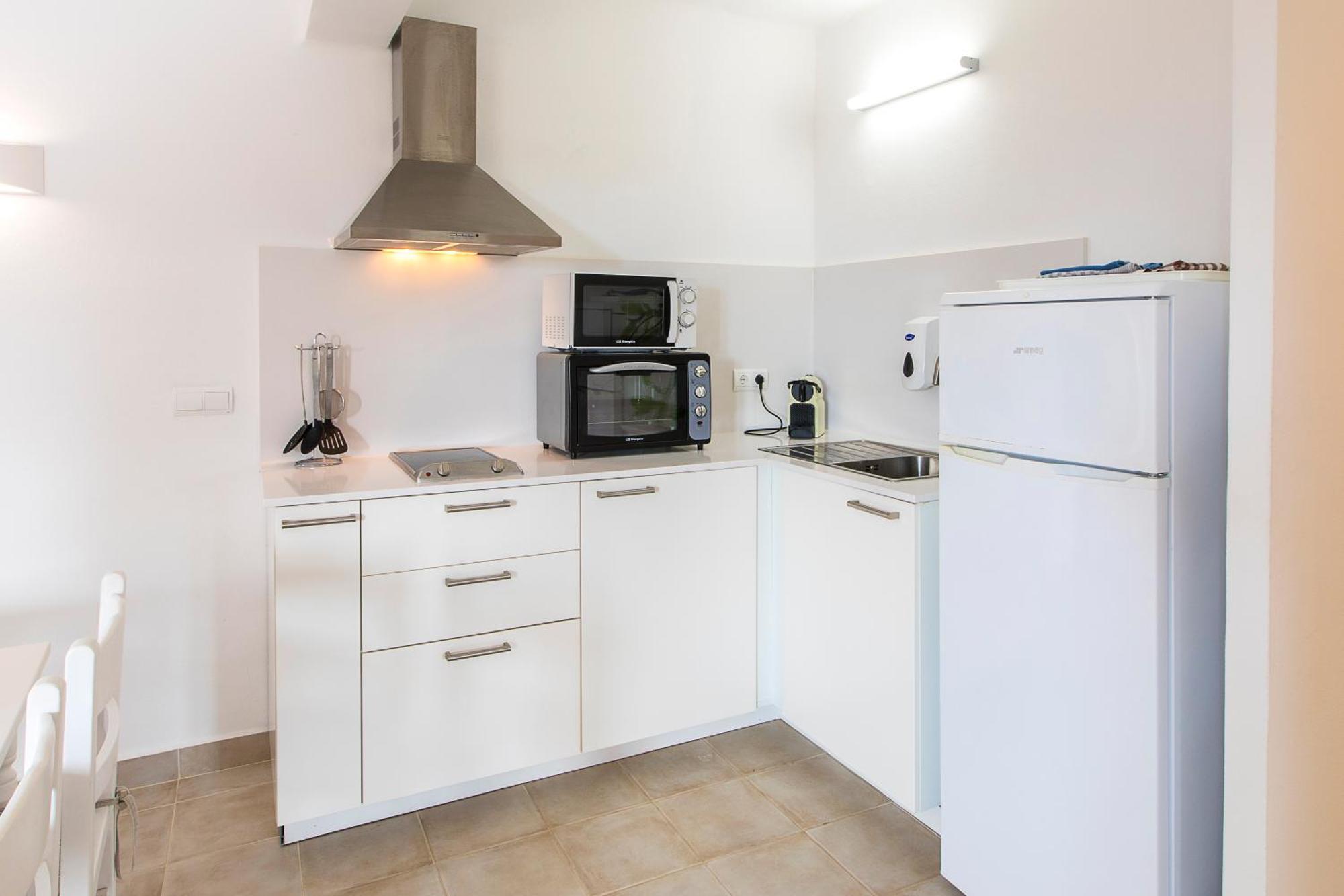 Ca Sa Vilda Apartment เอสปุญอลส์ ภายนอก รูปภาพ